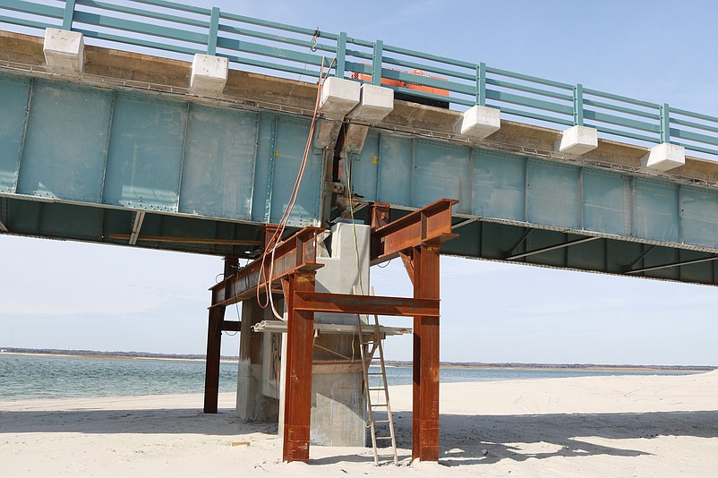 During work in 2019, new steel is used to support one of the concrete piers that hold the bridge's decking.