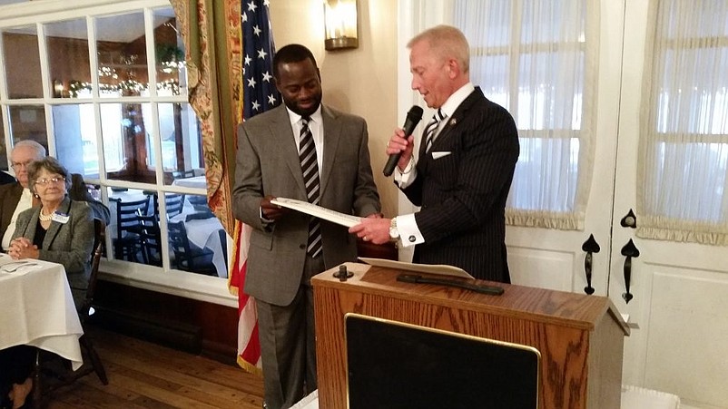 Antwan McClellan accepts an award honoring the late Ocean City civic leader Dick Grimes from then-state Sen. Jeff Van Drew, now a congressman, during a 2018 ceremony.