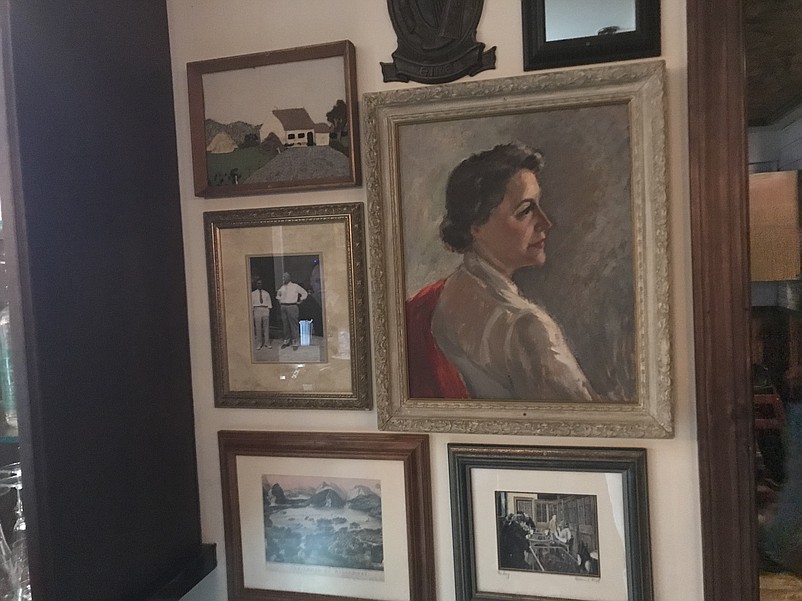 The portrait of the restaurant's namesake, Josie Kelly, to the right, is prominently displayed along with vintage photos.