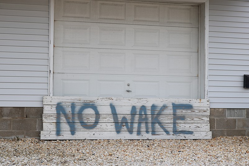 "No Wake" signs on private property are an appeal for courtesy.