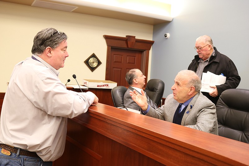 Mayor Leonard Desiderio, right, talks to Sea Isle construction official Neil Byrne about the Townsends Inlet Bridge after Tuesday's City Council meeting.