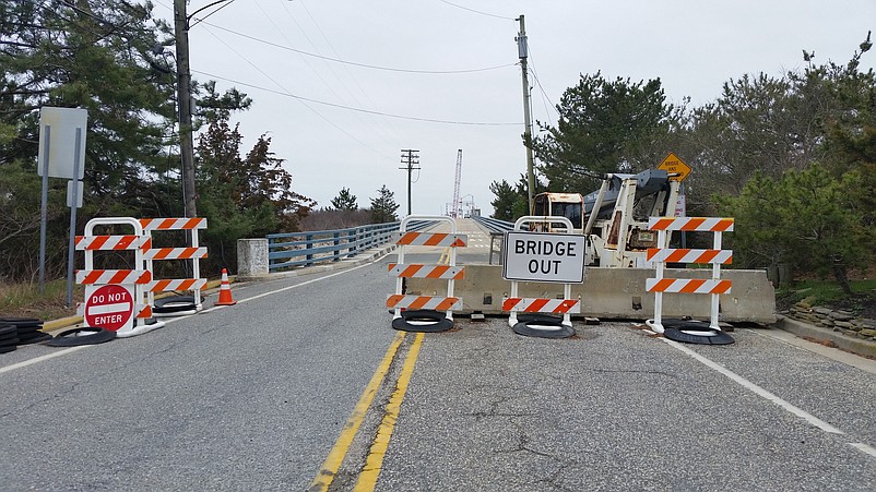 Motorists are confronted by a "Bridge Out" sign and barriers on the Sea Isle City side.