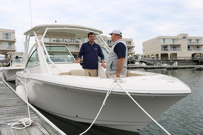 Sean McNulty and Adam Fox are shown last year in one of their boats in Avalon.