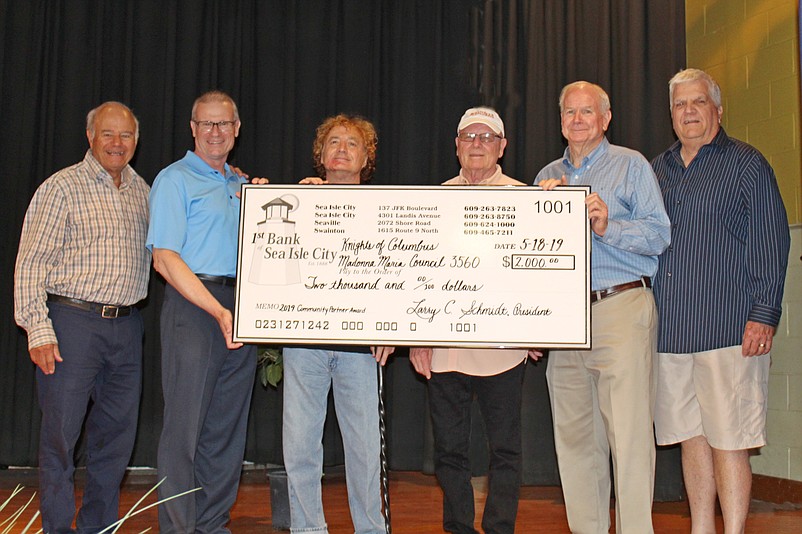 City Council President and First Bank of Sea Isle City Chairman Jack Gibson, First Bank of Sea Isle City President and CEO Larry Schmidt and Knights of Columbus members Dr. Andrew Sciranka, J.B. Flora, Mike McHale and Chuck Whinney.