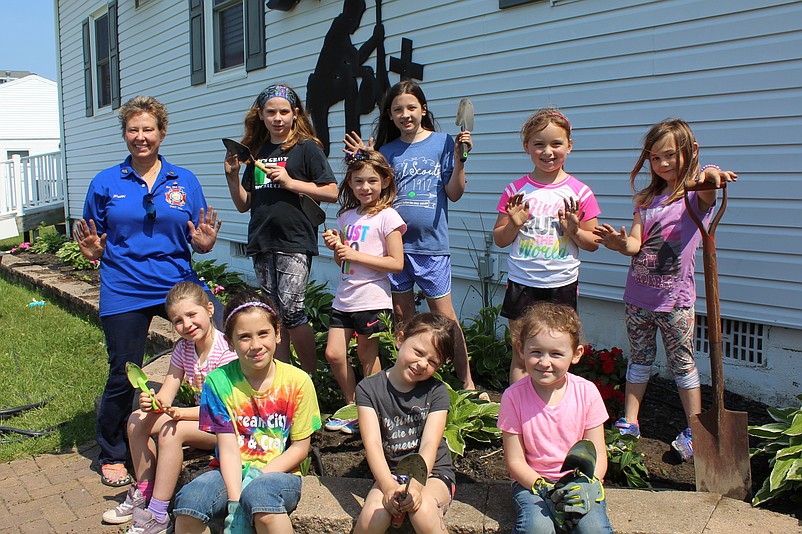 Girl Scout Troop 4102 helps beautify Sea Isle City. (Photo courtesy Sea Isle)