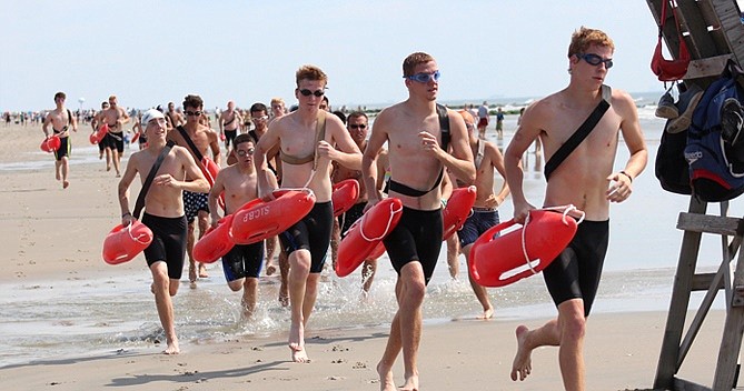 One part of the lifeguard test is a simulated surf rescue. (Photo courtesy of Sea Isle City)