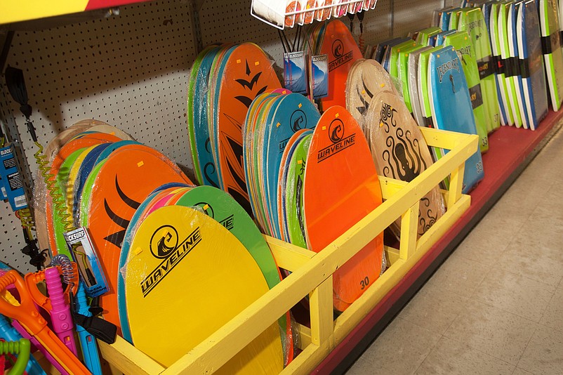 Beach accessories include a selection of boogie boards.