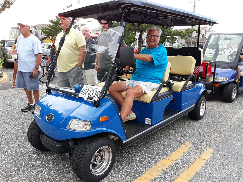 Bobby Maurone, a Sea Isle summer resident, waits for the bridge to reopen while sitting first in line.