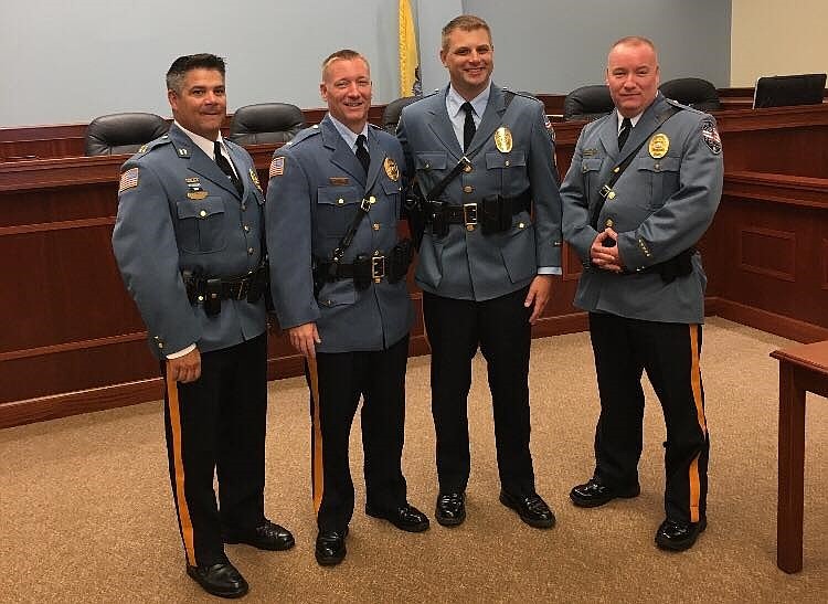 During a 2019 ceremony, Capt. Anthony Garreffi, left, joins with Lt. James McQuillen, Sgt. Shawn Lesniewski and then-Police Chief Tom McQuillen. (Photo courtesy Sea Isle City Police Department) 