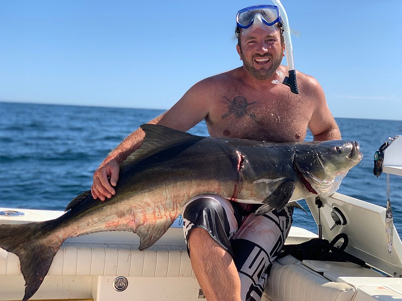 Joe Cunningham shows off his record catch. (Photos courtesy of Cunnningham family)