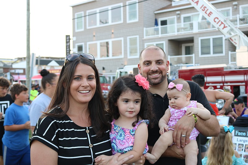 Alexa and Pete Campilango, of Sea Isle, with their daughters, Adriana and Giada, enjoy the night.