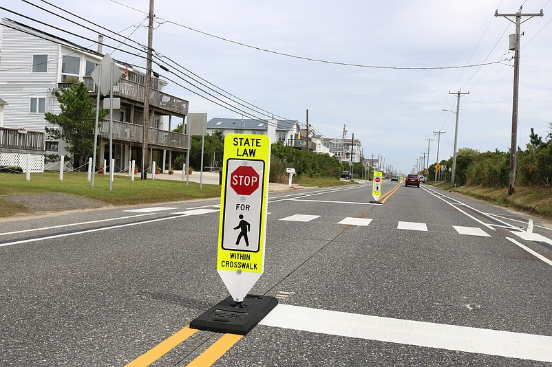 One Sea Isle City resident wonders whether there are too many of these pedestrian crossing signs along a stretch of Landis Avenue in the north end of town.