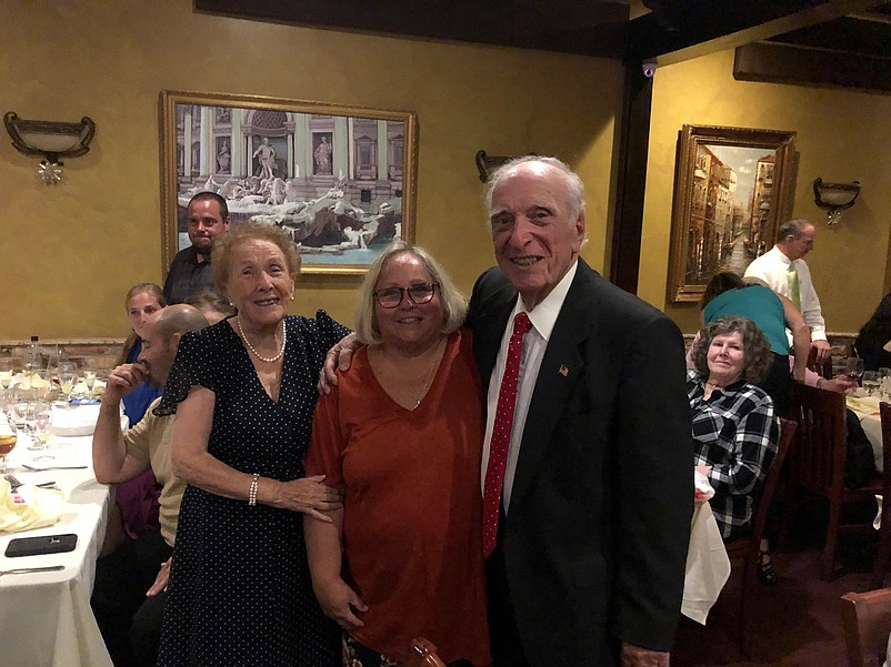 Diane Wieland is joined at the ceremony by Carmel and Leonard J. Desiderio, the parents of the late Gerard Desiderio.