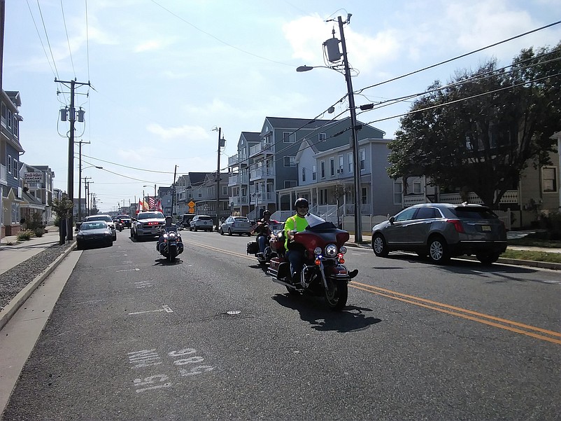 The caravan arrives at 46th Street and Landis Avenue to honor Cpl. Michael Crescenz.