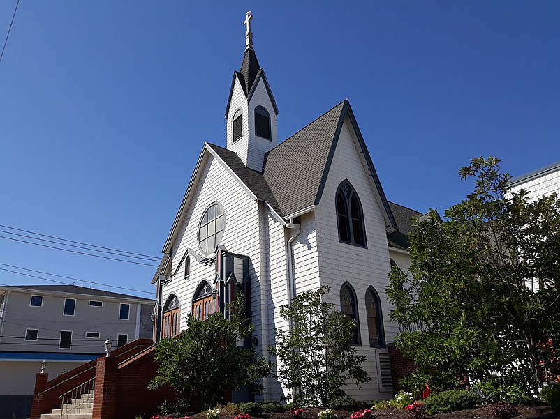 The historic St. Joseph Catholic Church, a 135-year-old landmark, occupies the corner of 44th Street and Landis Avenue.