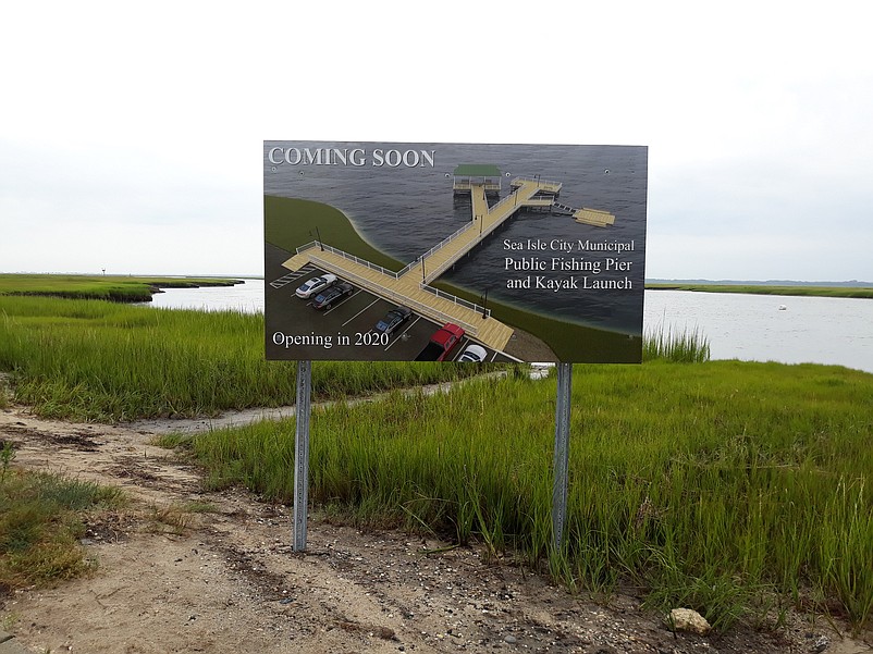 A sign gives a sneak preview of the bayfront project.