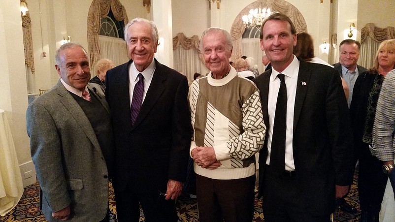 Mayor Jay Gillian, right, is joined by Sea Isle Mayor Leonard Desiderio, former Ambassador Bill Hughes and his father, former Ocean City Mayor Roy Gillian, in the election celebration. 