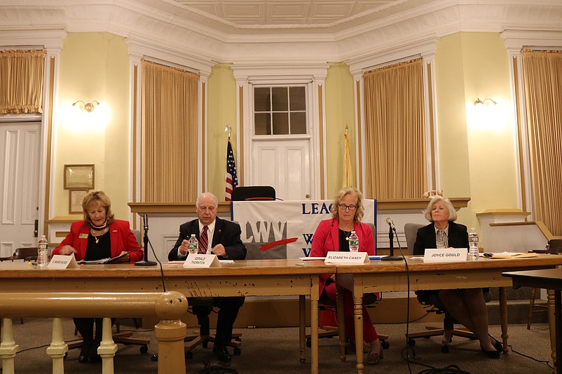 The debate is moderated by the League of Women Voters in a packed room in the old Historic Cape May Court House.