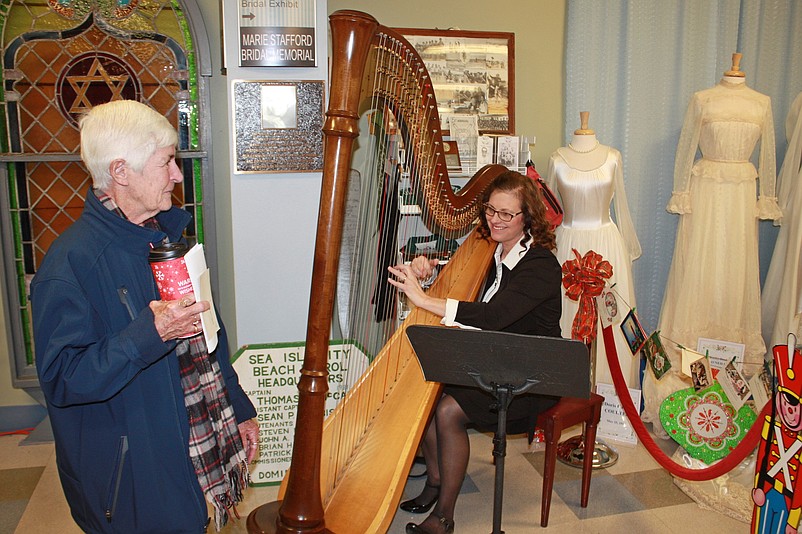 Visitors will be entertained by harp music during the Sea Isle City Historical Society and Museum's holiday open house on Saturday.