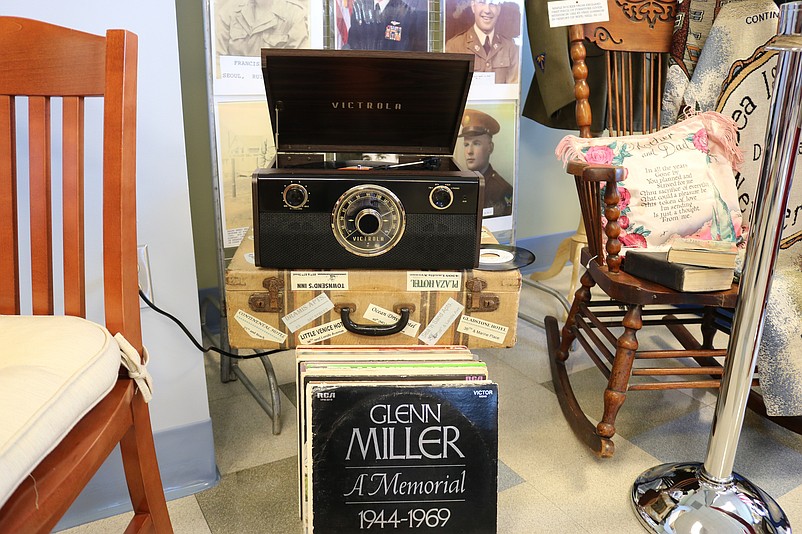 The vintage records and record player evoke nostalgia for visitors.