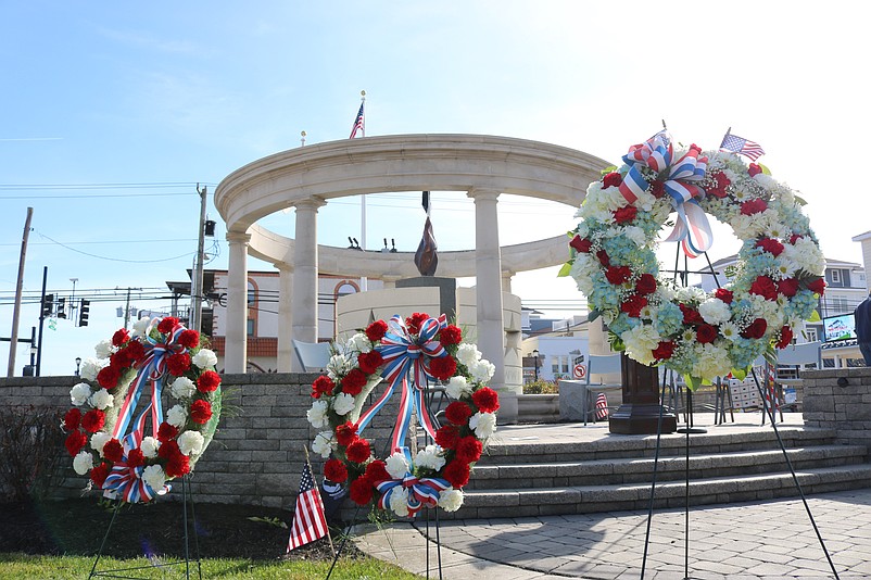 Red, white and blue wreaths decorate the monument at Veterans Park.