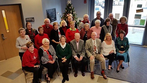 Mike Stafford, seated in center, joined the other members of the Historical Society &amp; Museum for a group photo in 2016.