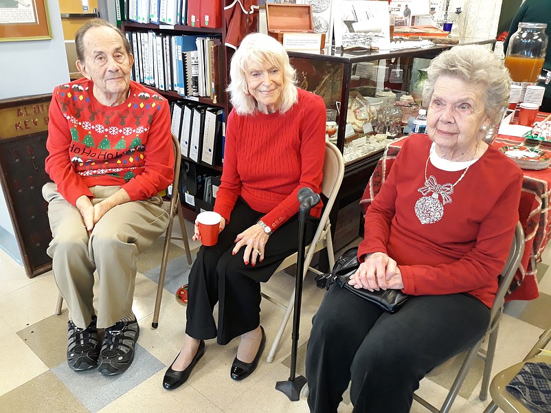 From left, museum volunteers Jack Steinberg, his wife, Ada, and Shirley Gill reminisce about Sea Isle's history.