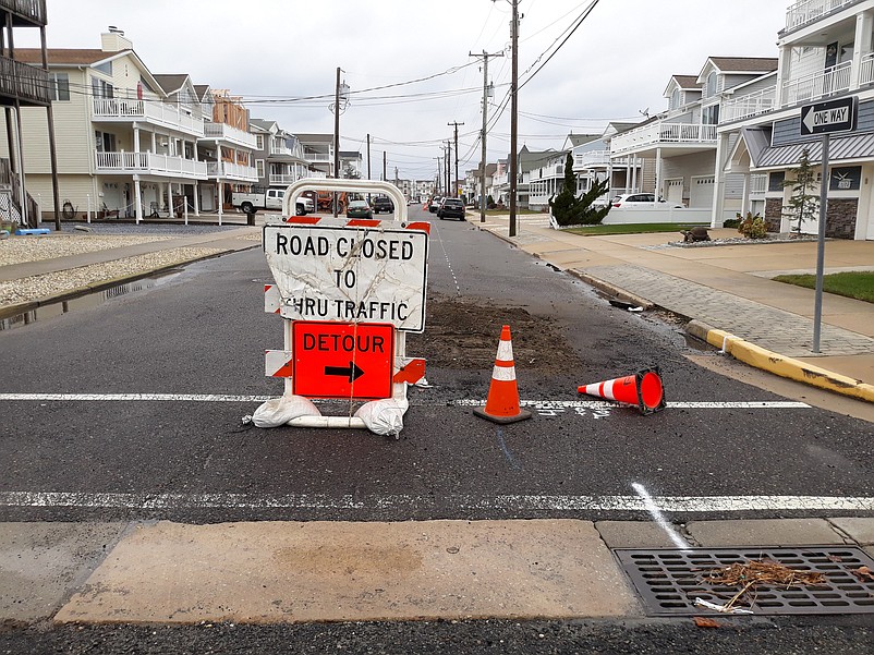 City officials are discussing whether off-duty police officers should be used for traffic control at road construction sites.