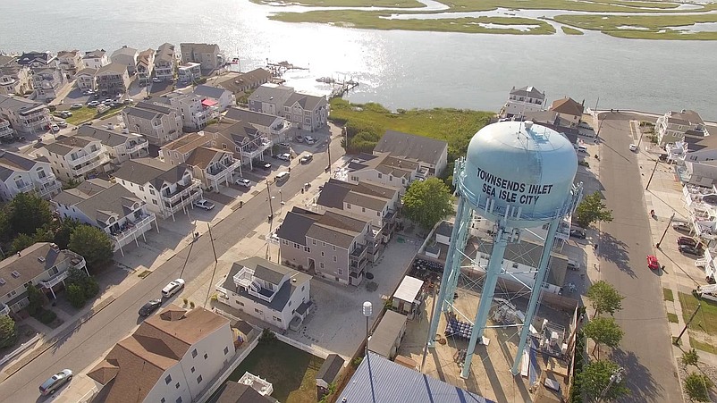 An aerial view of part of the Townsends Inlet section, including the landmark water tower. (Courtesy of Berkshire Hathaway HomeServices Fox &amp; Roach Realtors)