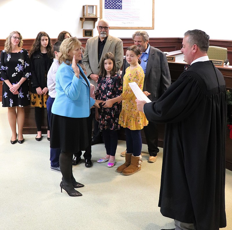 E. Marie Hayes, shown here being sworn in as freeholder Jan. 3, discloses her experience of being sexually assaulted when she was young.