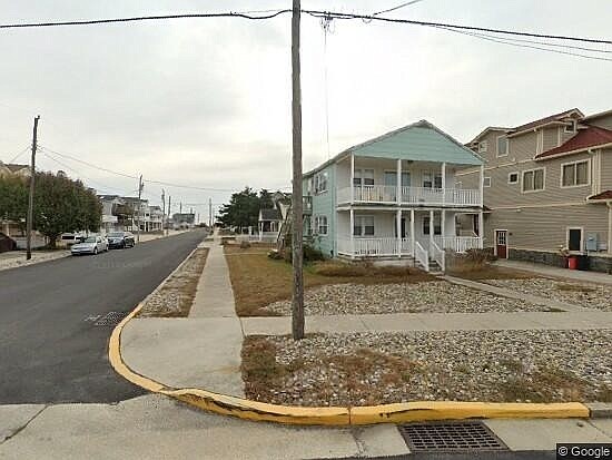 The "aesthetically challenged" duplex at 8901 Landis Avenue will be torn down and replaced with a new one. (Courtesy of Google images)