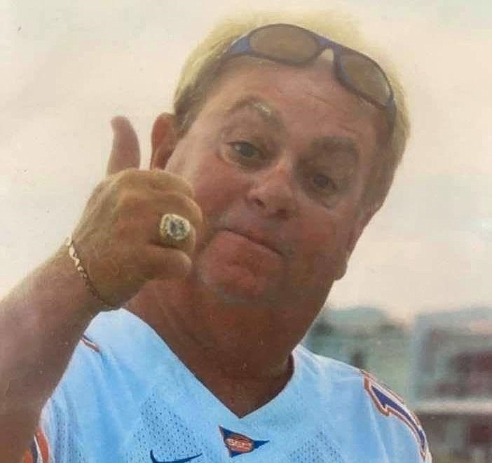 Chuck Betson, wearing the jersey of his beloved Florida Gators, flashes his Atlantic City Surf championship ring. (Photo courtesy Chuck Betson Facebook page).