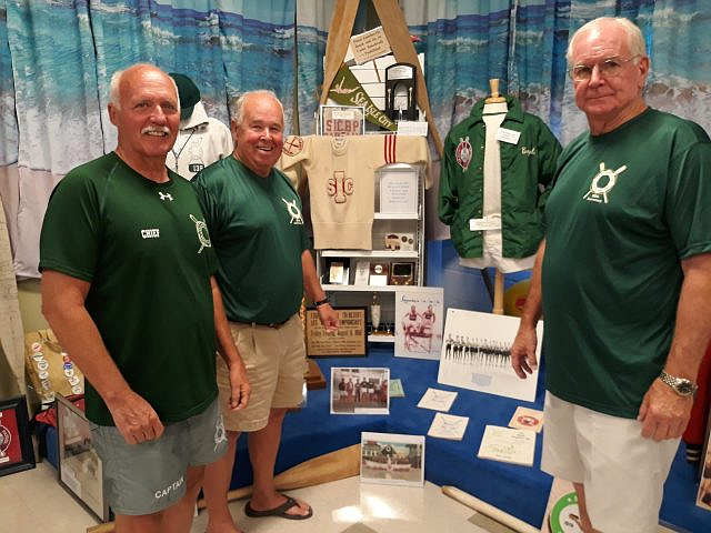 Sea Isle City Beach Patrol Chief Renny Steele (left) is joined by former Captains Bill Gallagher (center) and Mike McHale in front of a Beach Patrol exhibit at the Sea Isle City Historical Museum in 2020.