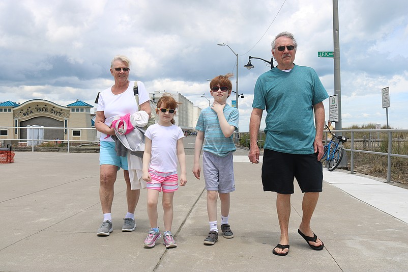 Betty and Al Giumetti, of Pilesgrove Township, N.J., are joined by their grandchildren, Rocco and Gabrielle, for a walk on the Promenade.