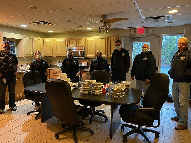 From left, are Upper Township Rescue Squad members John Carter, Amanda Graw, Melissa Coker, Chief Michelle Sampson, Patrick Dugan and James Sampson and Freeholder Jeff Pierson. (Photo courtesy of Cape May County)