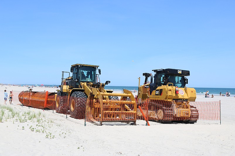 Heavy construction equipment needed for the project is being mobilized at the 57th Street beach.