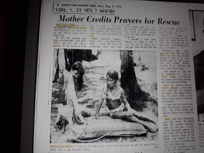 Shari Lynn Davis and her brother, Ricky, are shown looking at her raft in a newspaper photo after her rescue at sea in 1972.