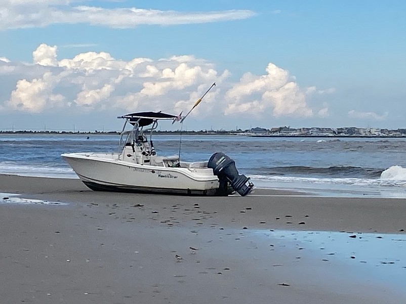 A cellphone aboard the recreational fishing boat helped police in identifying one of the boaters.