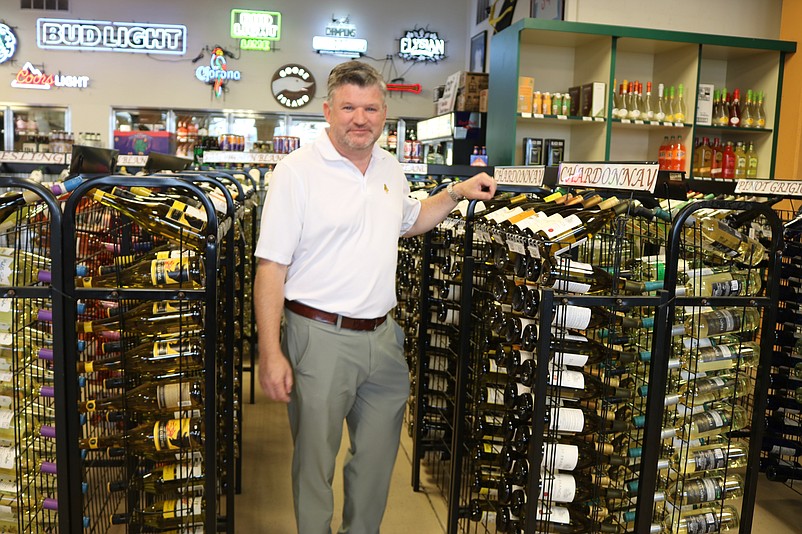 Christopher Glancey says sales were strong this summer at his Diamonds Liquor store.