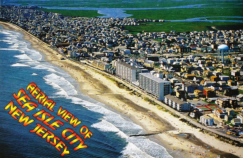 A postcard depicts the Promenade in the 1970s and the then-newly built Spinnaker Condominiums. 