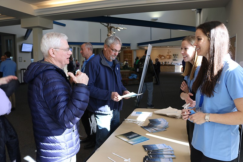 Orsted representatives answer questions from members of the public during the February meeting.