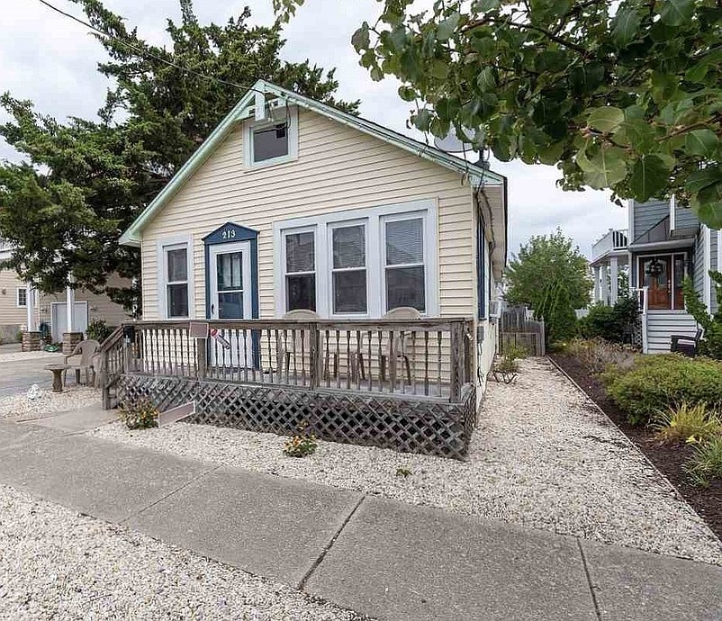 Opponents believe the large, three-story house that will replace this small home will be too large for the property.