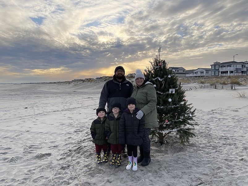 During Christmas, Nicholas and Shannon Giordano pose for a family photo in front of the tree along with their children, Gracelynn, Giovanni and Vincenzo. (Photo courtesy of Shannon Giordano)