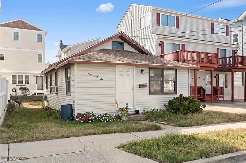 The old cottage at 126 90th Street fell into disrepair before it was demolished last year.