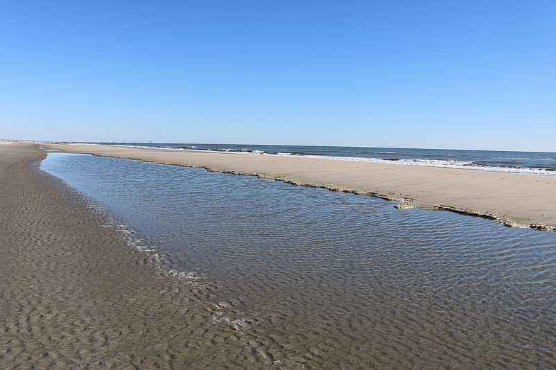 Pools of water have accumulated on some spots on the beach, according to the New Jersey Department of Environmental Protection's report.