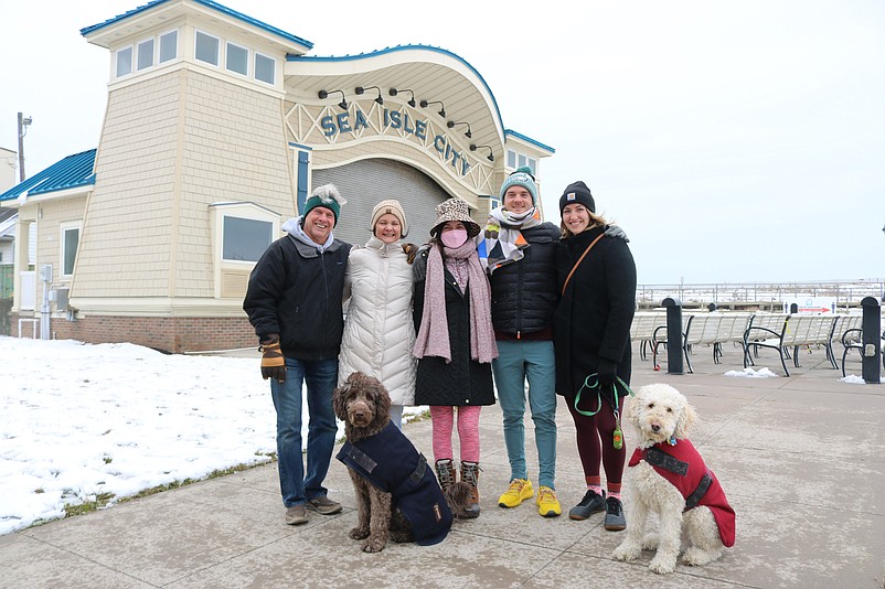 The Galliera family poses for a photo in front of the Band Shell at Excursion Park before the plunge.