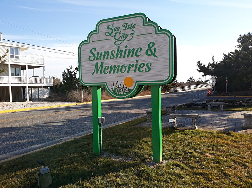 A new welcome sign at the foot of the Townsends Inlet Bridge declares that Sea Isle City offers "Sunshine &amp; Memories."