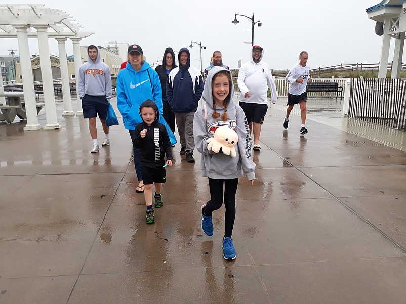 Members of the Moffett family, of Havertown, Pa., take a stroll on the Promenade.