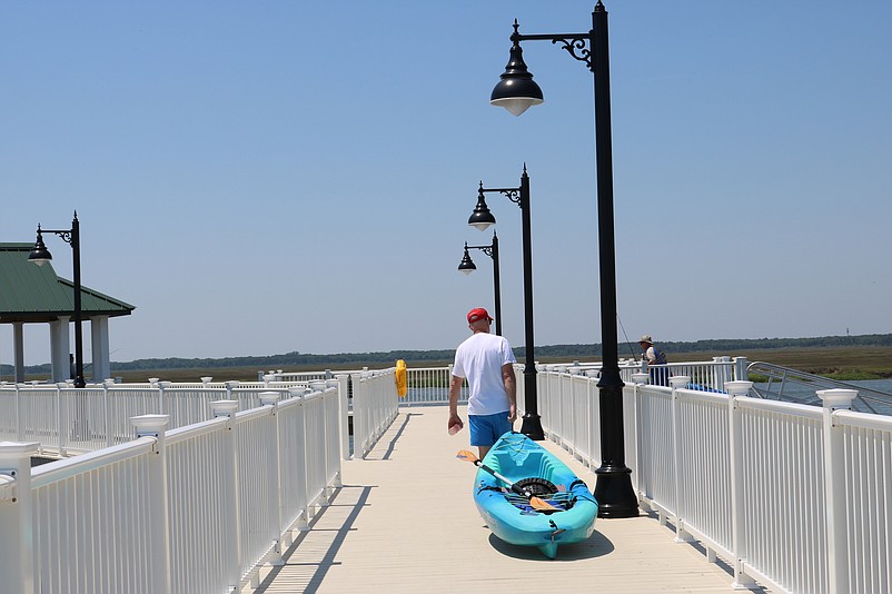 The city's kayak launch site and fishing pier are popular in summer.