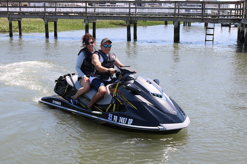 Linda and Mike DeLuca head out into the bay aboard their Waverunner.